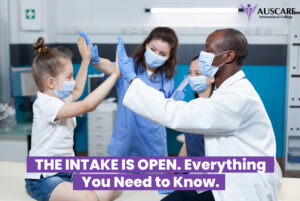 People in masks in a science lab high-fiving; AUSCARE International College logo visible, purple banner about intake open.